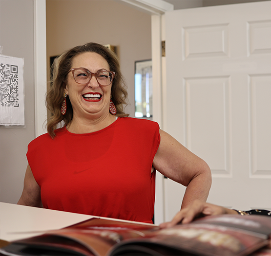Woman grinning in the dental office