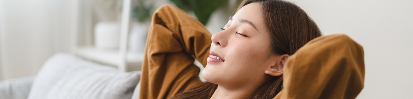 Woman relaxing thanks to sedation dentistry in Spring