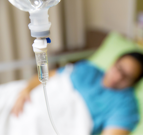 IV drip connected to a patient in the dental chair