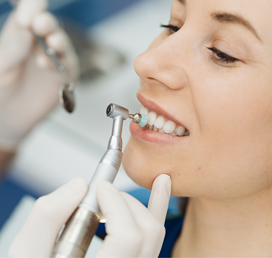 Woman getting a dental cleaning