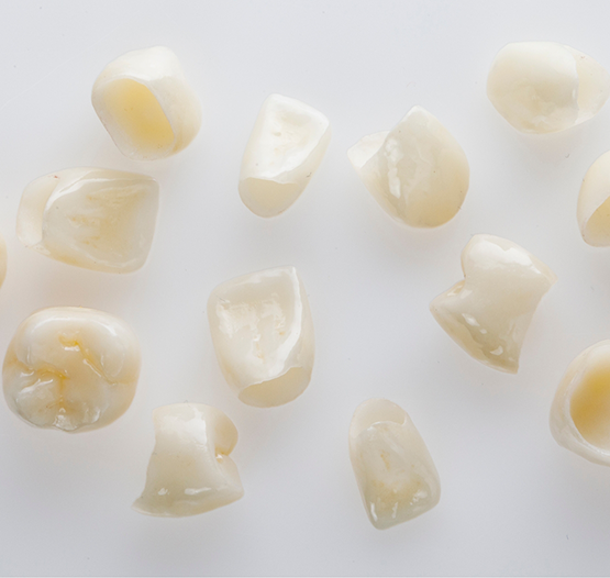 Several white dental crowns