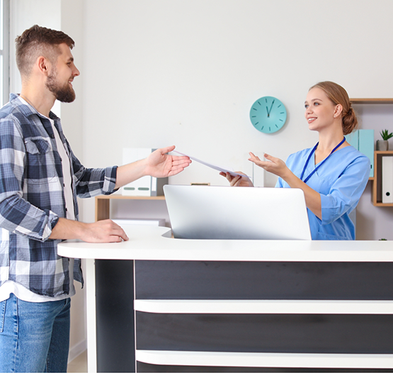 Man checking in at a dental office